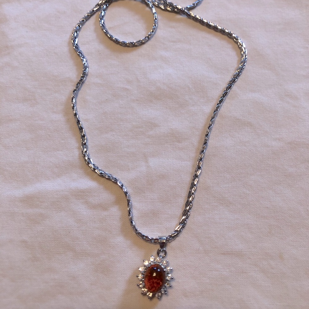 Necklace and charm.